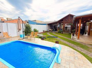 a51f5916476e0f3c145fdc6a7106f6b7fae087c1 · Casa com 3 dormitórios à venda, 168 m² por R$ 660.000,00 - Nereidas - Guaratuba/PR