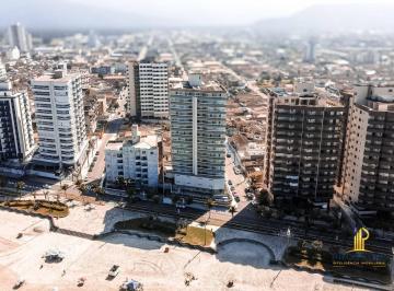 Vista aérea do edifício · Cobertura frente mar com 4 dormitórios