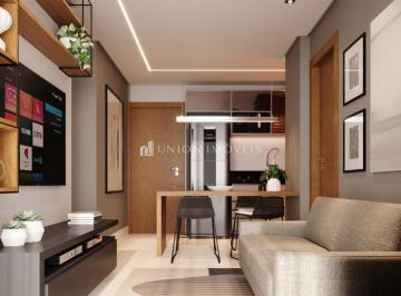 Sala 2 ambientes/Cozinha integrada · Apartamento de 2 quartos com varanda gourmet à venda no bairro Centro em Juiz de Fora/MG.