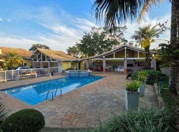 804690929a8f15acc9527d0ae73ccca22eb8d611 · Casa térrea em con. fechado com 1.000 mt de terreno, piscina e muito mais!
