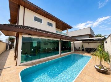 gta4y4w2yte0yja3zgqyztdj_md · Casa com 4 suítes, piscina aquecida e espaço gourmet no Jaguary - Urbanova.