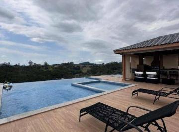 230cd5cc3ce5f7327630b069ba5c8106cb920c1e · Casa mobiliada à venda com 4 Suítes e 479 m² no Recanto Santa Bárbara em Jambeiro/SP