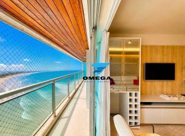 d764ad2c4fc476e8510adec6bffd2e3e0560ed76 · Apartamento reformado frente mar à venda na praia das Pitangueiras no Guarujá I Omega Imoveis