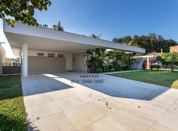Foto 01 · Imóvel de Luxo em Porto Alegre-RS: Casa à Venda no Chapéu do Sol - 4 Quartos, 3 Suítes, 3 Salas, 4 B