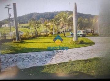 d8ef500bce71c4dd64b4542268499bc21d356b8c · Área, 9.982 m², à venda por R$ 450.000 - Rua Volta Redonda, 16 - Caxito - Maricá/RJ