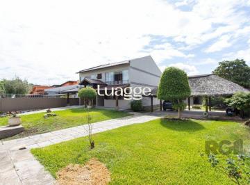 Casa · 256m² · 4 Quartos · 3 Vagas · Com 4 dormitórios, incluindo uma suíte, é perfeita para acomodar toda a sua famí