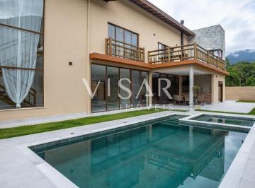 Casa · 270m² · 4 Quartos · 2 Vagas · Casa em Caraguatatuba com área de lazer