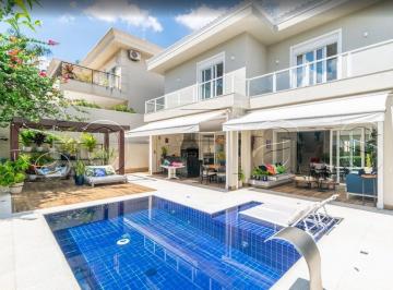 Casa · 472m² · 4 Quartos · 4 Vagas · Casa de luxo mobiliada no Itahyê com 4 suítes, piscina privativa e 4 vagas