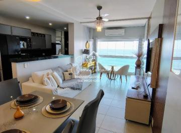 Foto 03 · Apartamento frente mar com lazer nas Astúrias: 2 quartos, 1 suíte, 2 salas, 2 banheiros, 1 vaga, 70m