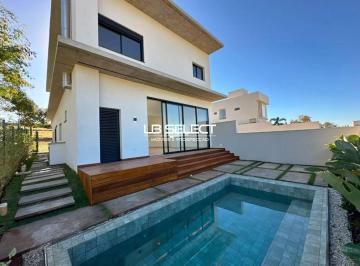 a9bfbb4c195afd92089fbfb6d5c6a41298dbdb59 · Casa com 3 dormitórios à venda, 215 m² por R$ 2.100.000,00 - Condomínio Terras Alpha - Uberlândia/MG