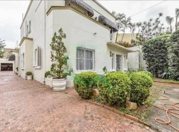 1064d77425db4cb0018dba9a7db407318bb42e7d · Casa no Jardim Paulista: 476 m² de terreno, 4 quartos e 3 vagas.
