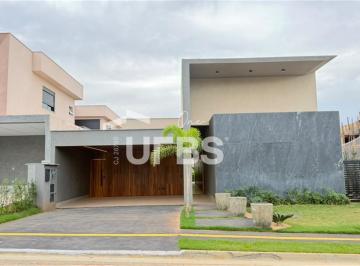 Casa · 300m² · 4 Quartos · 4 Vagas · Casa térrea à venda no condomínio Jardins Itália em Goiânia com 4 suítes e área de lazer com piscina
