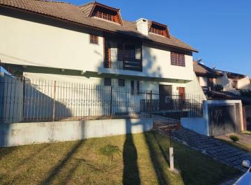 Foto 1 · 
                    Duplex Amplo com 4 Quartos, Suíte, Lareira e Churrasqueira no Tarumã
          