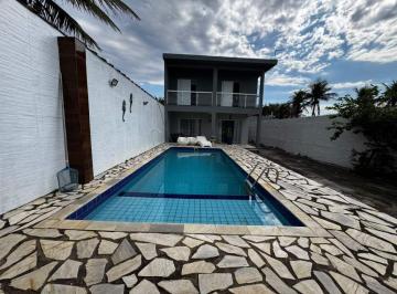 Casa de 3 quartos, Itanhaém · Casa de frente ao mar, com 3 quartos, piscina e área gourmet. Localizado em Itanhaém.