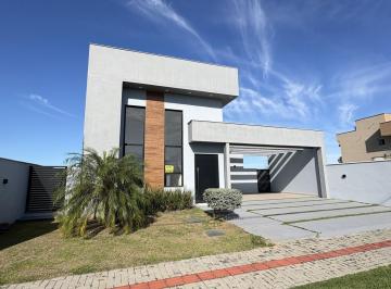 Casa · 174m² · 3 Quartos · 4 Vagas · Casa de alto padrão com 3 dormitórios à venda, 173m² por R$1.200.000 - Cond. Sol