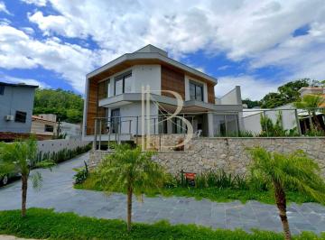 Casa · 302m² · 4 Quartos · 3 Vagas · Casa nova com 4 suítes, vista para o mar e piscina no Cacupé