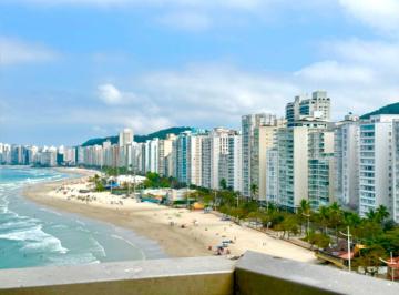 e053981dc7876bc1bad276c4d7b7aa2c69e204ea · Apartamento com vista mar à venda na praia das Pitangueiras no Guarujá I Omega Imoveis