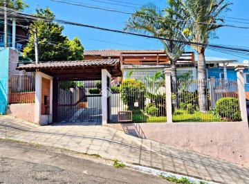 Casa · 171m² · 2 Quartos · 2 Vagas · Casa com 2 dormitórios (1 suíte com closet) à venda em Novo Hamburgo