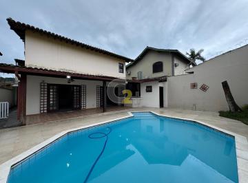 Casa · 297m² · 4 Quartos · 2 Vagas · Sobrado à venda no Canto do Forte, Praia Grande com 4 quartos, 2 suítes e 2 vagas de garagem.