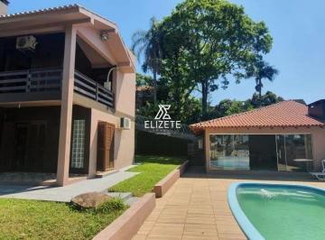 Casa · 253m² · 3 Quartos · 2 Vagas · Casa com Piscina em meio a Natureza, à minutos do Centro de Novo Hamburgo