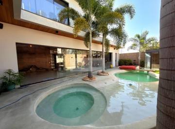 4eae8b3a7d1662cbf00f6f8114a5f67afabd3c34 · Sobrado com 4 dormitórios para alugar, 412 m² por R$ 19.860,00/mês - Jardim Residencial Dona Lucilla