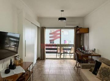 4eeb0f65bc436e9a14918e1e02586550505a3bb3 · Apartamento com varanda e vista para o mar, em São Vicente/SP