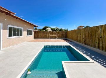 Foto 02 · Casa a venda com piscina e 3 quartos em Búzios em condomínio com portaria 24hrs e estrutura de lazer
