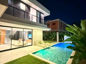 Foto 01 · A 5ª Avenida Imóveis apresenta esta excepcional residência contemporânea no Condomínio Parque Costa