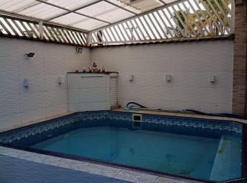exqwqoo2ytvhndi0ngqzzgvh_md · Casa isolada com piscina à venda no Flórida, em Praia Grande SP.
