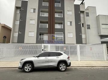 img_38221787668676123.jpeg · Apartamento 2 dormitórios, sendo 1 suite com elevador à venda, 50 m² área útil. Sala com varanda gri