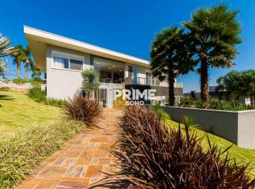 Casa em condomínio à venda com 430m², 4 suítes e terreno de 1.228m² · Casa em condomínio à venda com 430m², 4 suítes e terreno de 1.228m²