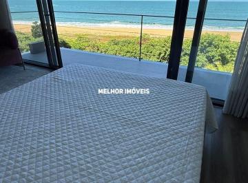 Casa · 315m² · 3 Quartos · 2 Vagas · Condomínio Vila Aroeira - Casa triplex Nova Frente mar á venda com 3 suítes sendo uma máster na Prai
