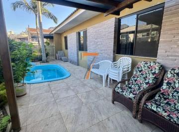 7e31b0eb79e07a590ef39b4f5b0a56f213637f69 · Casa com 3 dormitórios à venda, 221 m² por R$ 1.490.000,00 - Canto - Florianópolis/SC