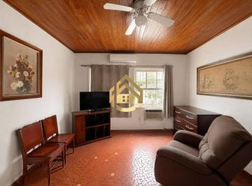 6c6eb4af97a66fec75f7d454d8ed3bb7fda51e08 · Casa com 2 dormitórios à venda por R$ 800.000,00 - Praia das Pitangueiras - Guarujá/SP