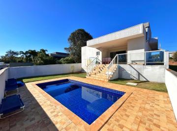 Casa · 164m² · 3 Quartos · 3 Vagas · Casa à Venda no Ninho Verde 2 | Piscina, Área Gourmet e Vista para o Pôr do Sol