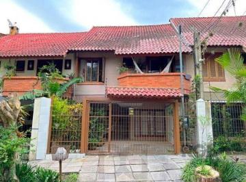 .jpg+2025-03-04 · Casa em Porto Alegre, no bairro Guarujá, com 3 dormitório(s), e 3 banheiros, à v