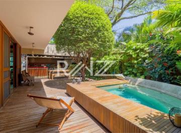 1 · Casa térrea com jardim e piscina no City Boaçava