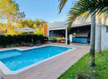 359a0f1fe9339cf470c2d19bb57fe7297a61c292 · Casa térrea em condomínio com piscina e espaço gourmet!