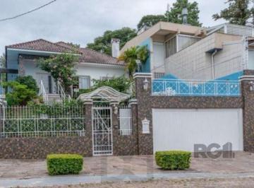 .jpg+2025-03-04 · Casa em Porto Alegre, no bairro Vila Assunção, com 3 dormitório(s), e 3 banheiro