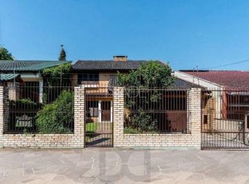 Casa · 230m² · 3 Quartos · 3 Vagas · Residência no bairro Camaquã, com 3 dormitório(s), e 3 banheiros,