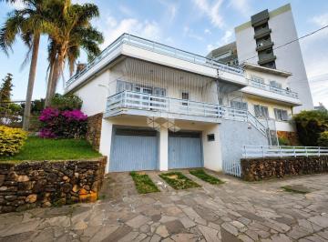 Comercial · 308m² · 4 Quartos · 3 Vagas · Casa comercial com 4 dormitórios e 3 vagas de garagem, no bairro Vila Ipiranga, em Porto Alegre.