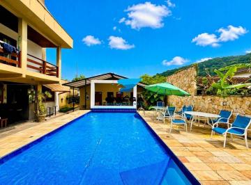 2635df5738fd975732ea2ef936e10f9f13060619 · Casa á venda em condomonio fechado na praia do Pernambuco no Guarujá I Omega Imoveis