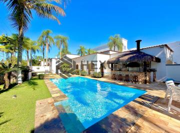 Foto · Casa de alto padrão com piscina e área gourmet no Jardim Acapulco, Guarujá