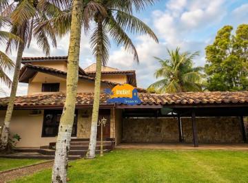 Foto 01 · Casa de Alto Padrão em Condomínio Fechado ? 5 Suítes, Espaço Gourmet e Estilo Rústico-Tropical Exclu