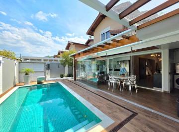Imagem do Imóvel · Casa à venda na praia de Juquehy com 4 suítes e piscina privativa