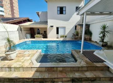 owolzcm2ythlzjq1otgyztkw_md · Sobrado 4 dormitórios com piscina em Mongaguá