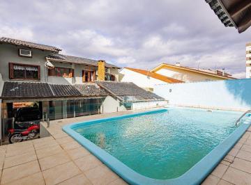 Casa · 208m² · 4 Quartos · 3 Vagas · Casa de 4 dormitórios e 208m² à venda no Bairro Jardim Botânico, Porto Alegre.