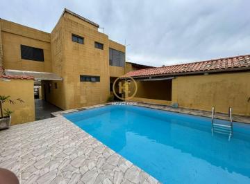 60fae73d4c3a6a2315b6accb11e2348d2caeec86 · Sobrado á 900 metros do mar com 3 dormitórios sendo 1 suite, com piscina a venda por R$ 430.000 - Pa
