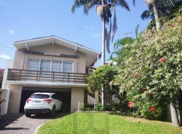 Casa de 3 quartos, Porto Alegre · Casa 3 quartos com suíte, espaço gourmet, piscina, 7 vagas de garagem, na Triste