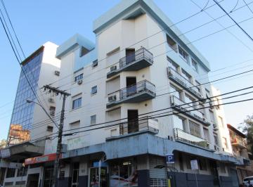Apartamento · 80m² · 2 Quartos · 1 Vaga · 2 dormitórios + dependência no centro com garagem